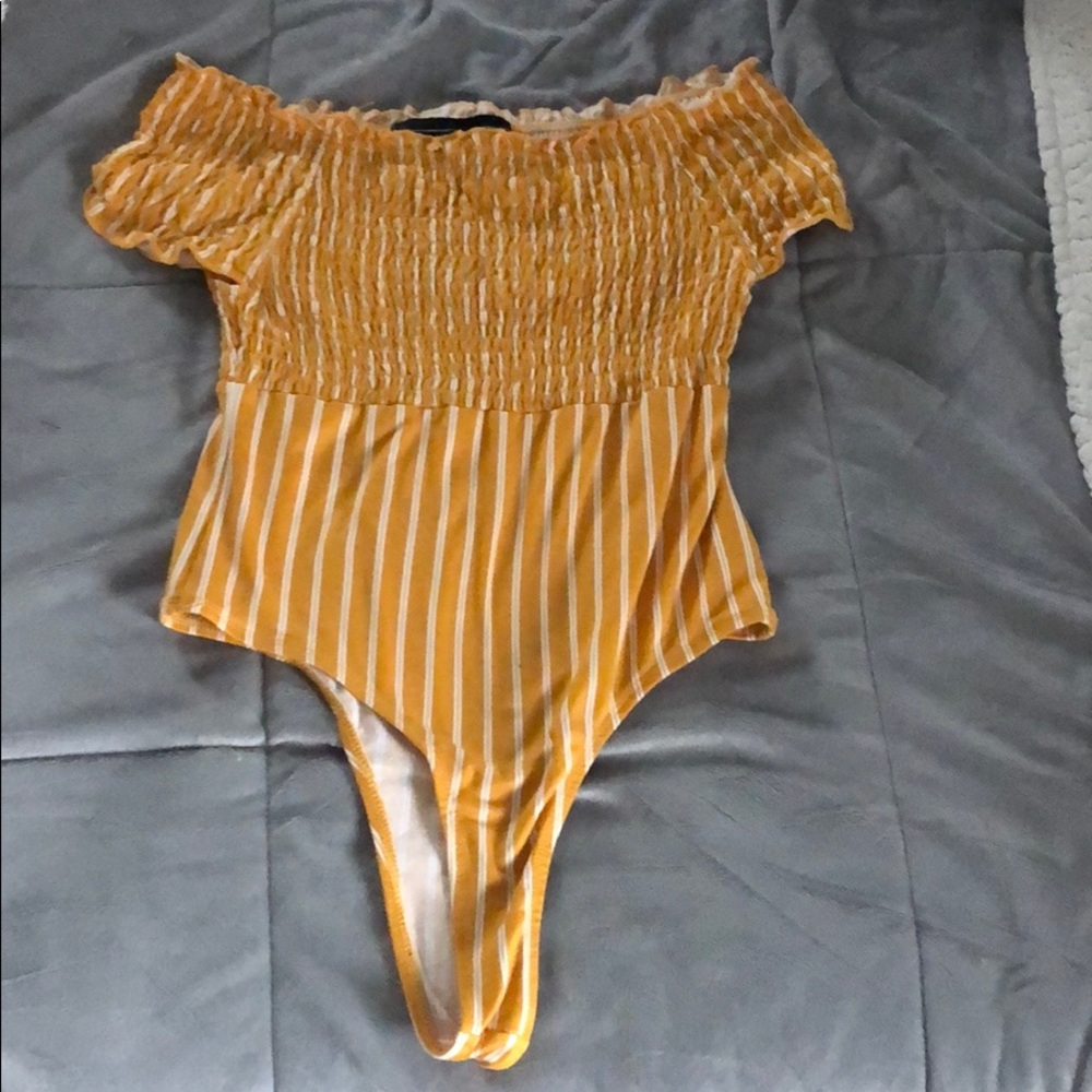 Yellow body suit